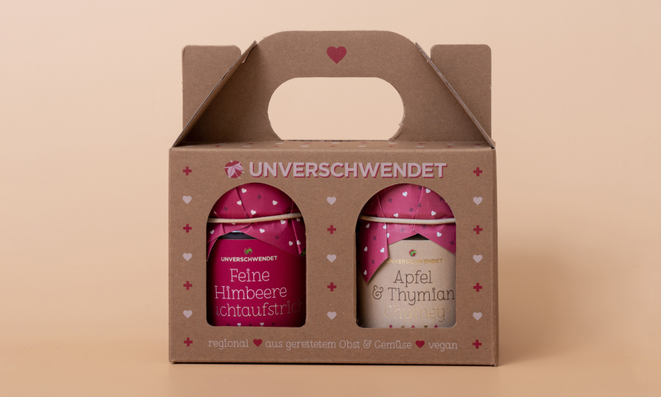 unverschwendet Feinkost Duett Feine Himbeere Fruchtaufstrich und Apfel & Thymian Chutney in der Geschenkverpackung als Werbegeschenk.