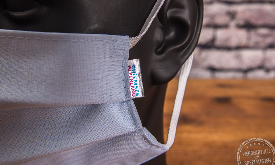 Mund-Nasen-Maske als Werbegeschenk mit Logodruck Chiemsee Tourismus