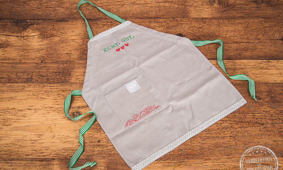 Kochsch&uuml;rze bestickt als Werbegeschenk von Bergbauern Milch