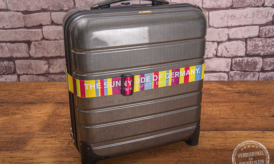 bedrucktes Kofferband mit bunten Streifen und Logodruck des BaW&uuml;