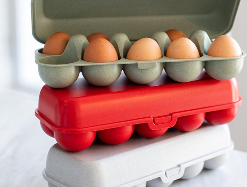 Wiederverwendbare Eicherschachteln in rot, grün und weiß von Koziol als Werbeartikel