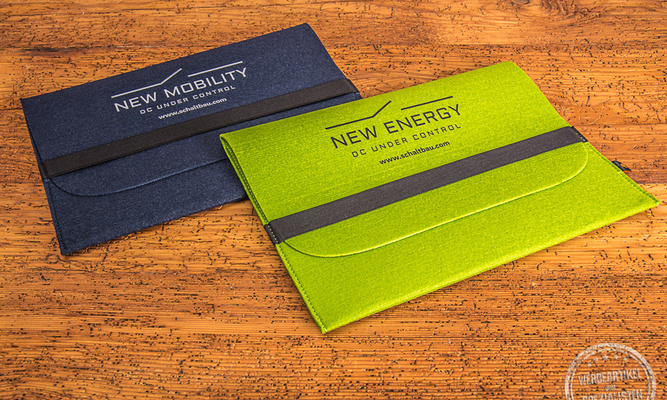 Zwei Filzmappen in DinA4 mit Logoanbringung in Maigr&uuml;n und Dunkelblau