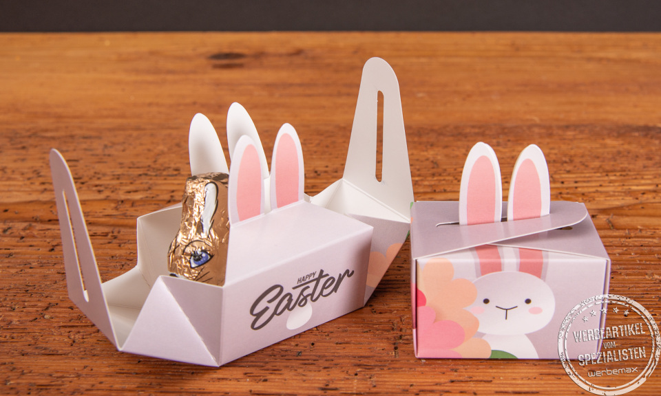 Geschenkbox Mini mit Verschlussform Hasenohren und Füllung Schoko-Osterhase.