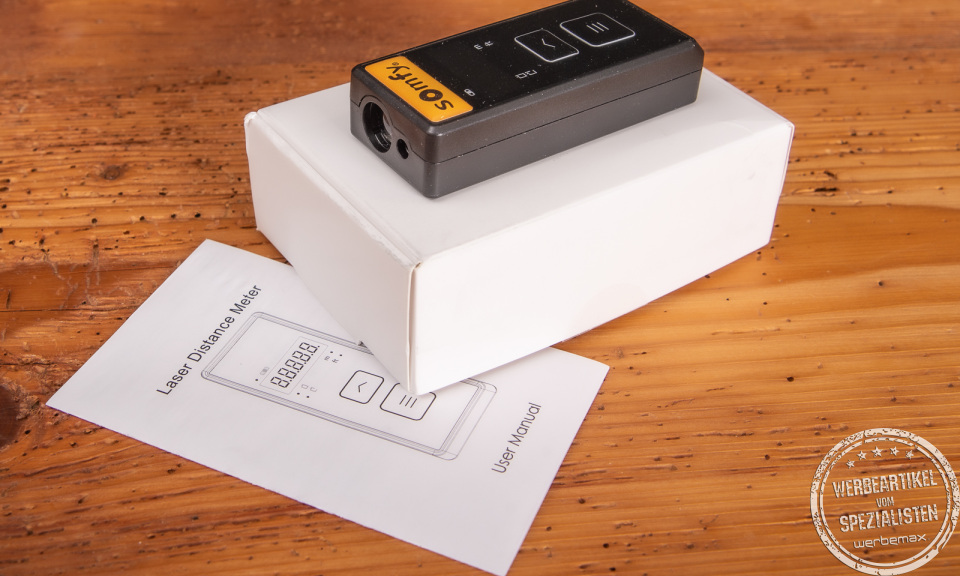 Laserdistanzmesser mit Logo-Doming mit Verpackung als Werbegeschenk.