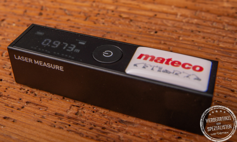 Laser-Distanzmesser mit Logo-Doming als Werbegeschenk.