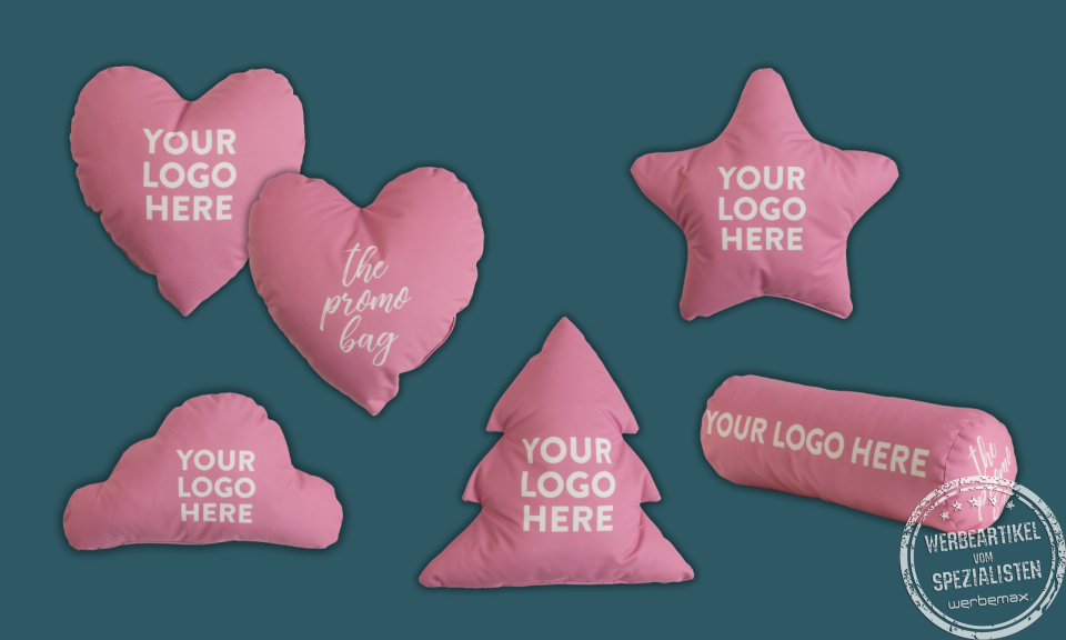 MAGMA Heimtex Kissen in Sonderformen rosa mit wei&szlig;em Logodruck als Werbemittel.