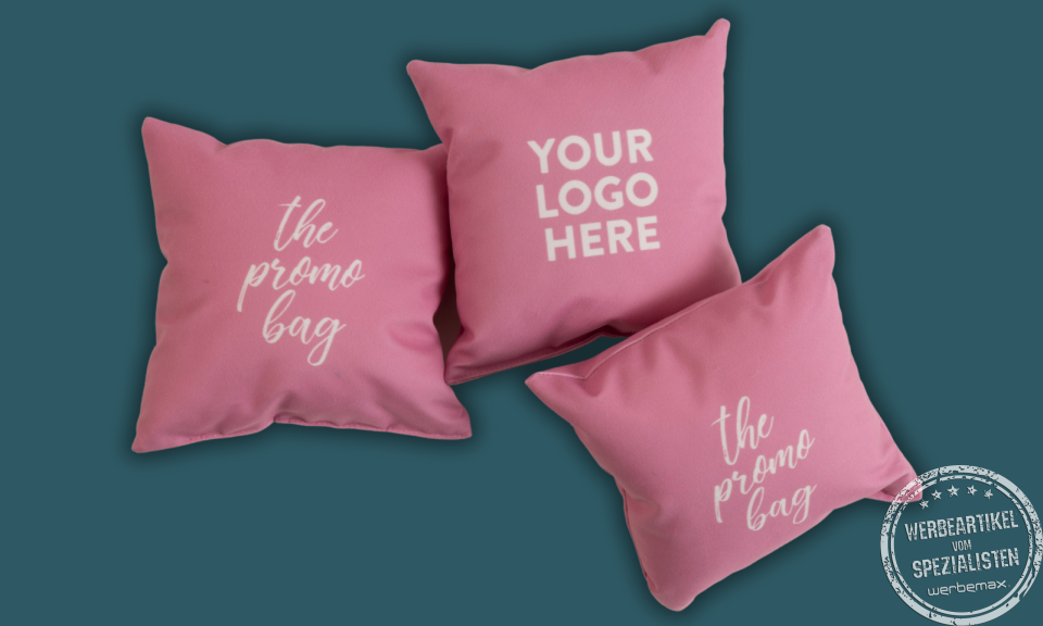 Kissen rosa mit wei&szlig;em Logodruck von MAGMA Heimtex als Werbeartikel.