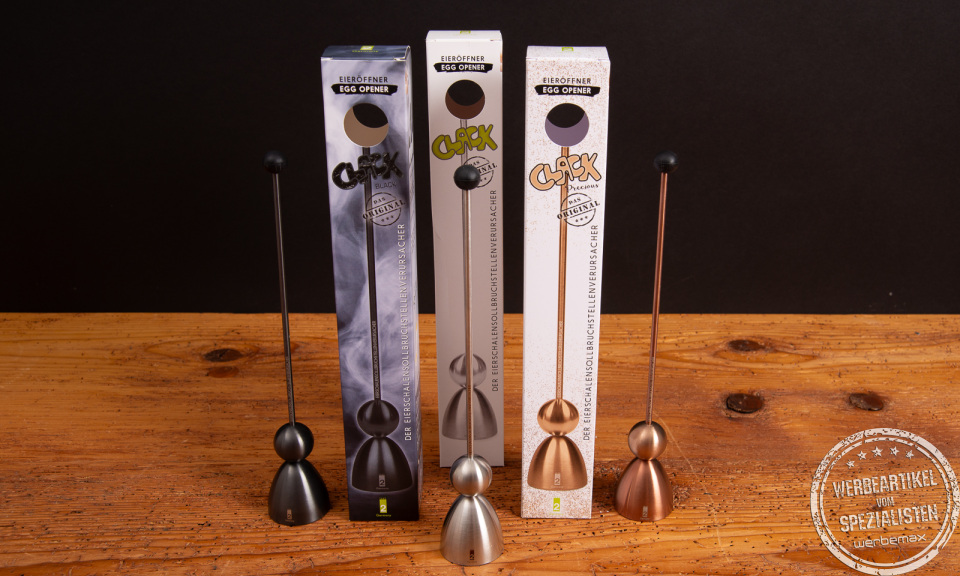Clack Eieröffner von take2 in Schwarz, Edelstahl und Roségold mit Originalverpackung – stylisches Frühstückszubehör Made in Germany.
