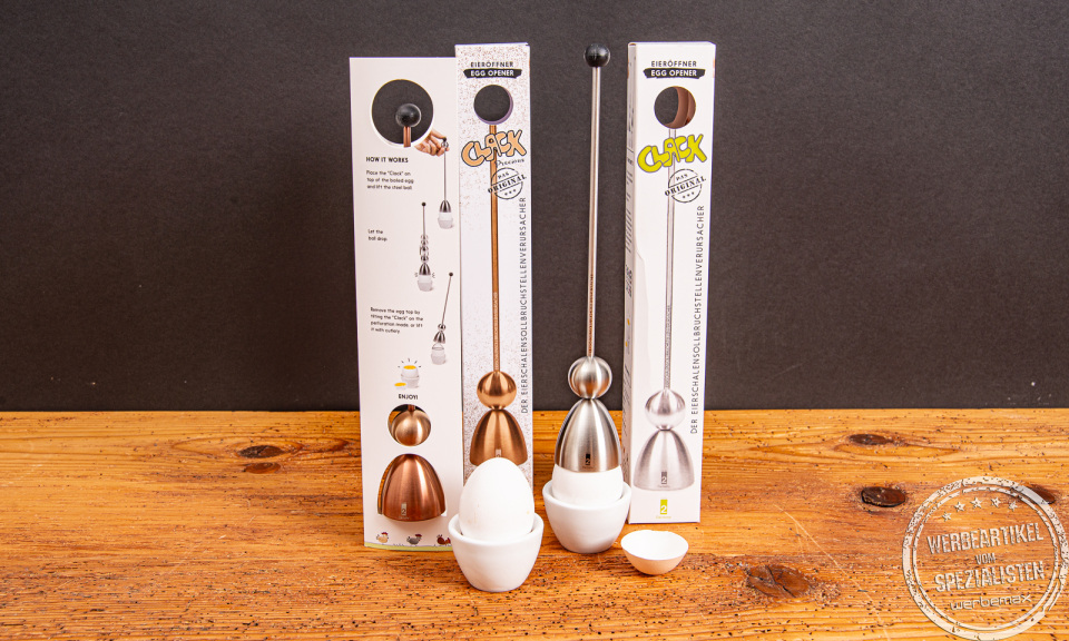 Zwei Clack Eierköpfer aus Edelstahl mit Verpackung im Vergleich – ideal zum sauberen Öffnen von Frühstückseiern.