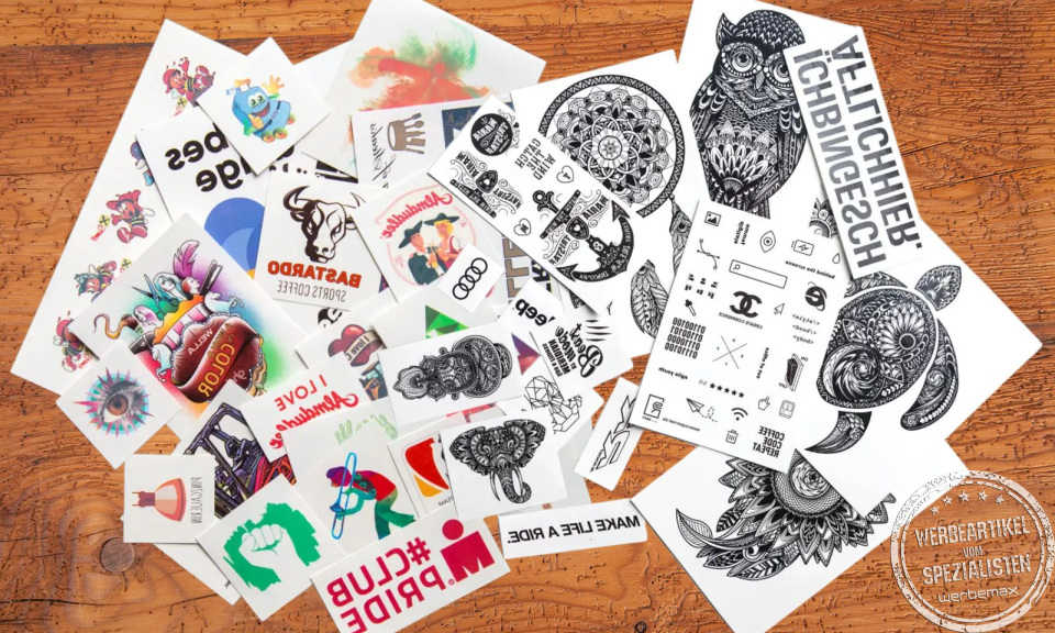 Klebetattoos in bunt und schwarz mit individuellen Motiven als Giveaway.