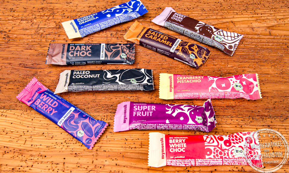 Bunte Auswahl an mymuesli Bio-M&uuml;sliriegeln &ndash; nachhaltiger Snack als Werbegeschenk.
