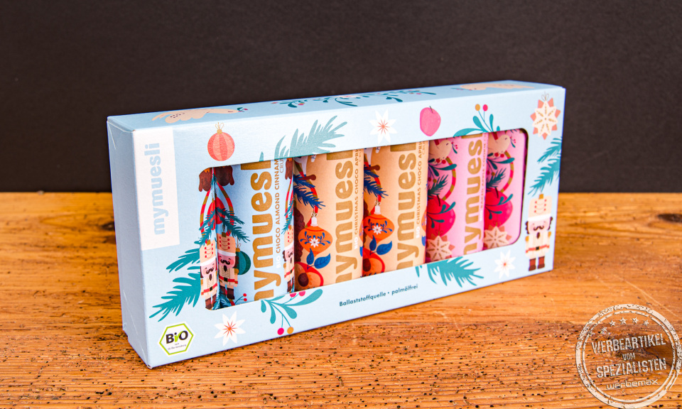 mymuesli Weihnachts-Edition mit fünf Mini-Dosen – festliches Geschenkset für Kunden und Mitarbeiter.