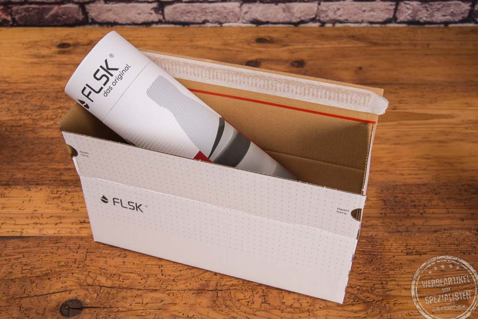 FLSK Flasche im Karton mit Versandkarton
