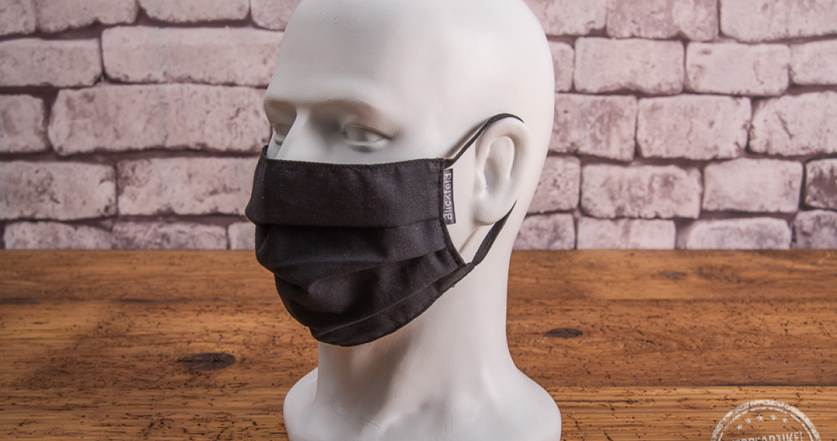 Schwarze Mund-Nasen-Maske aus Baumwolle mit Weblabel