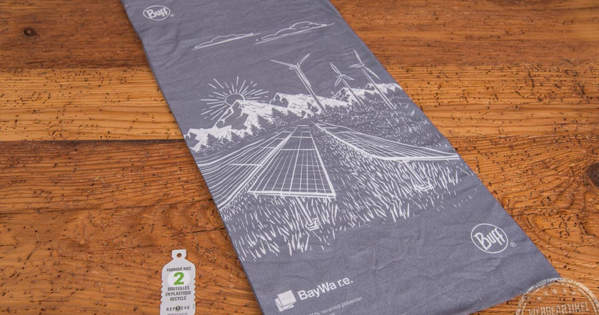 ausgebreitetes buff Multifunktionstuch Baywa r.e. mit allover-Design als Merch.