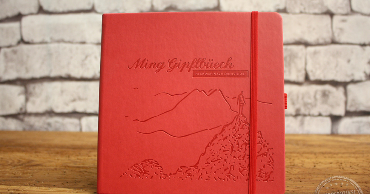 rotes Notizbuch mit Pr&auml;gung "Gipfelbuch" f&uuml;r Oberstdorf