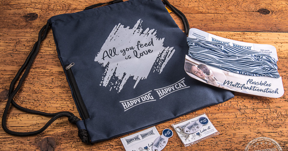 Happy Dog Happy Cat Werbeartikel dunkelblauer Matchrucksack mit wei&szlig;em Logodruck, individuelles MUFU und Einkaufswagenl&ouml;ser