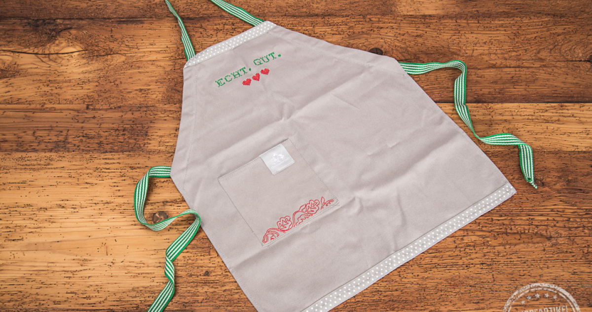 Kochsch&uuml;rze bestickt als Werbegeschenk von Bergbauern Milch