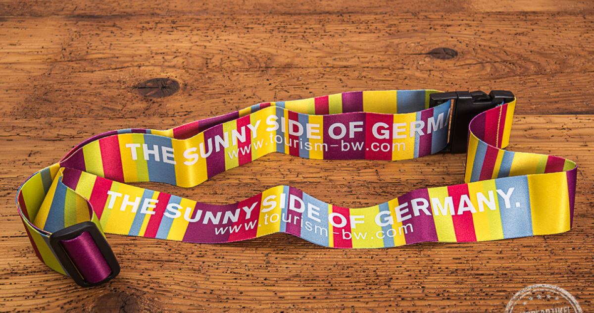 Kofferband im vollfl&auml;chigen Druck als Werbeartikel umgesetzt