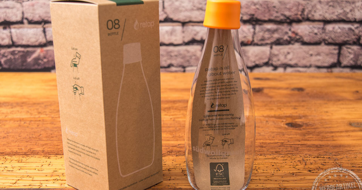 retap flasche mit Verpackung und gelbem Deckel 