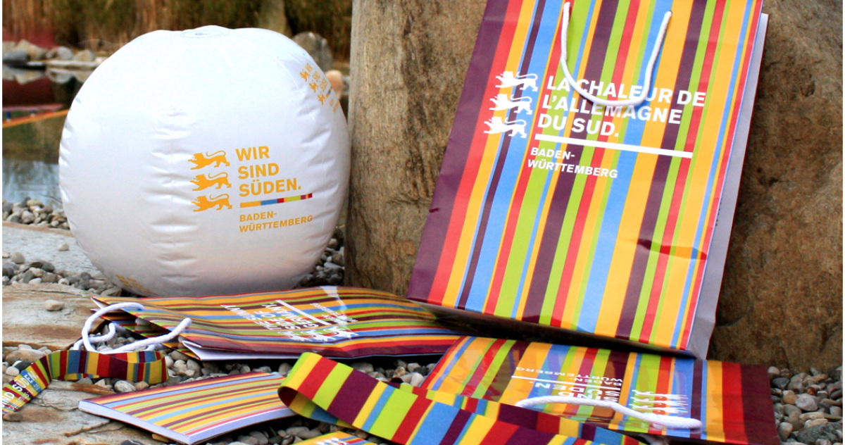 tourismus-badenw&uuml;rttemberg-wasserball-stift-block-t&uuml;te-bunt-urlaub