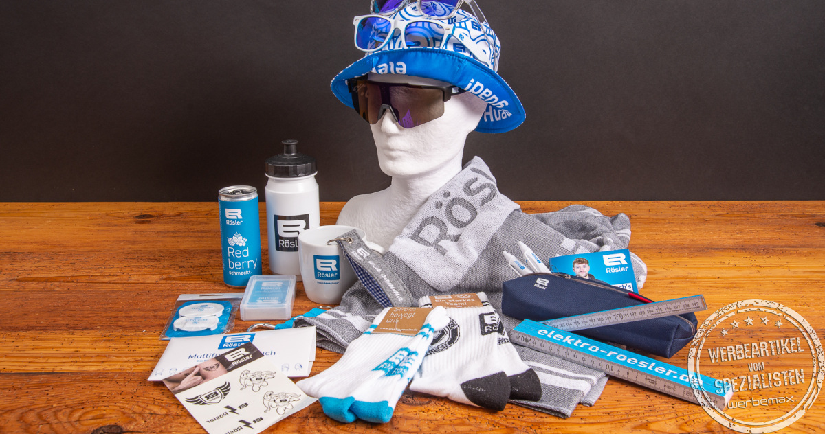 Vielseitige Werbeartikel für Elektro Rösler, darunter Sonnenhut, Brillen, Trinkflasche, Socken und weitere Giveaways für Azubimesse und Employer Branding.