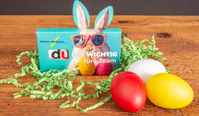 Duplo-Schokoriegel im 3er Werbekarton mit Hasenohren und dem Aufdruck "Du bist wichtig f&uuml;rs Team" als Werbeartikel f&uuml;r Mitarbeiter und Kunden. 