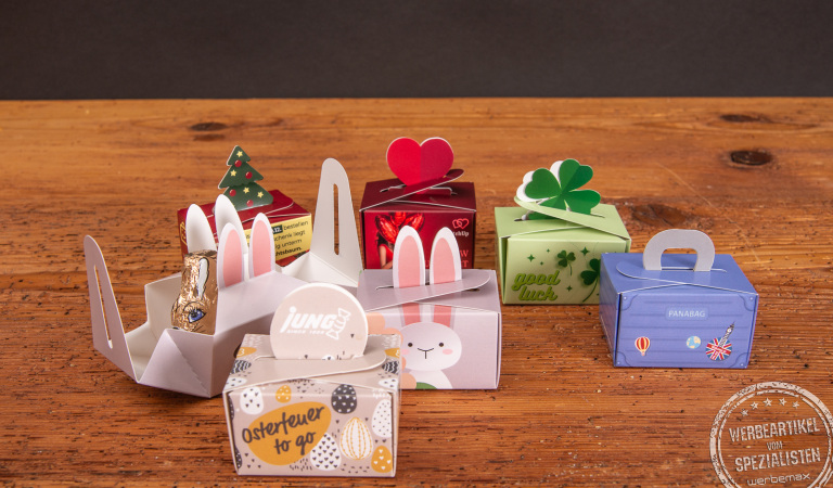 Werbegeschenke mit süßem Inhalt. Die nachhaltige Kartonbox kann beliebig mit Ihrem Wunschinhalt befüllt werden. Jetzt bei werbemax anfragen. 