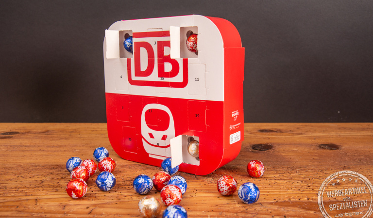 Appventskalender von Lindt in Form einer App, gefüllt mit Lindt Schokolade (Kugeln) als Weihnachtsgeschenk für Mitarbeiter in der Adventszeit. 