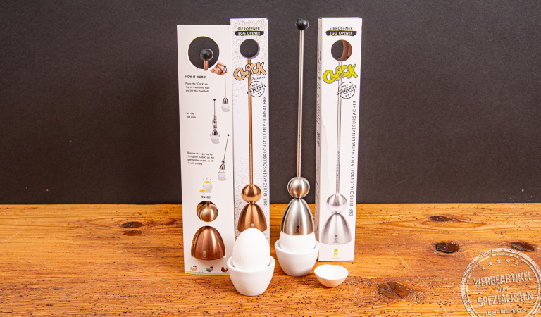 Zwei Clack Eierköpfer aus Edelstahl mit Verpackung im Vergleich – ideal zum sauberen Öffnen von Frühstückseiern.