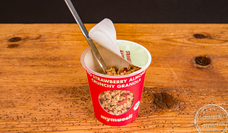 mymuesli Becher mit Löffel – Bio Müsli to go als nachhaltiges Werbegeschenk.